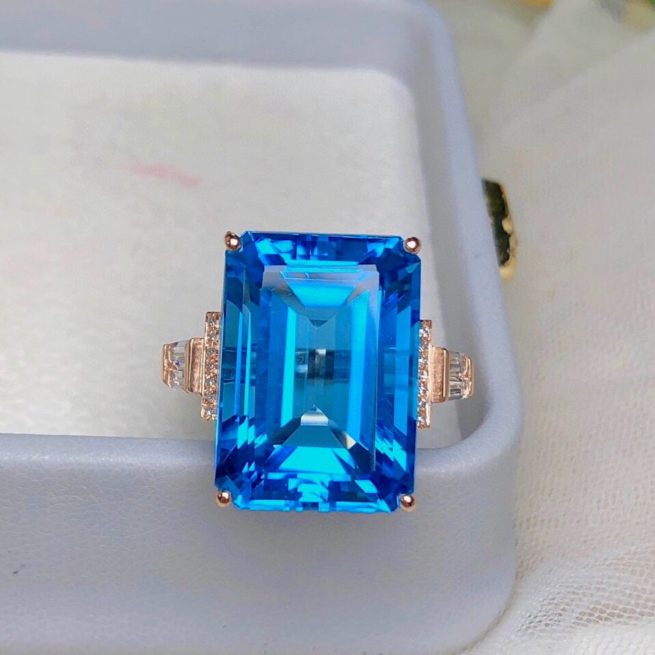 14k Gold 21.8 Ct Natural Topaz & Diamond & Sapphire Ring: Ref:230975025 // gold content:14k gold // ring size:7. 25us // // main gemstone:topaz // shape:octagonal // carat weight:21. 8ct // color:blue // treatment:natural // // adjacent gemstone 2 : diamond 