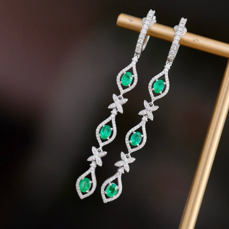 14k Gold 1.5 Ctw Natural Emerald & Diamond Earrings: Ref:230975034 // gold content:14k gold // main gemstone:emerald // shape:oval // carat weight:0. 8ct // color:green // treatment:natural // // adjacent gemstone 2 : diamond // shape:round // carat wei
