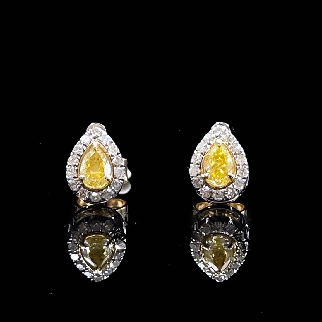 14k Gold 0.6 Ctw Natural Yellow Diamond & Diamond Earrings: Ref:230975039 // gold content:14k gold // main gemstone:yellow diamond // shape:pear // carat weight:0. 3ct // color:yellow // treatment:natural // // adjacent gemstone 2 : diamond // shape:round //