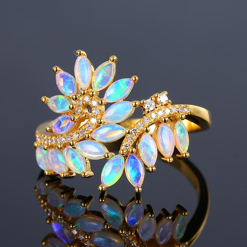 14k Gold 0.91 Ctw Natural Opal & Diamond Ring: Ref:230975045 // gold content:14k gold // ring size:7. 25us // // main gemstone:opal // shape:marquise // carat weight:0. 81ct // color:color // treatment:natural // // adjacent gemstone 2 : diamond