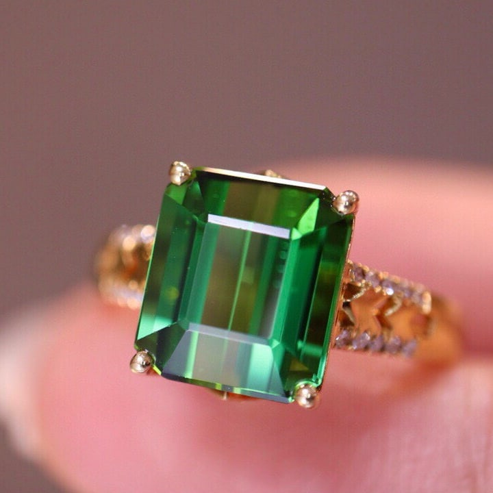 14k Gold 4.88 Ct Natural Tourmaline & Diamond Ring: Ref:230975061 // gold content:14k gold // ring size:7. 25us // // main gemstone:tourmaline // shape:octagonal // carat weight:4. 88ct // color:green // treatment:natural // // adjacent gemstone 2 :