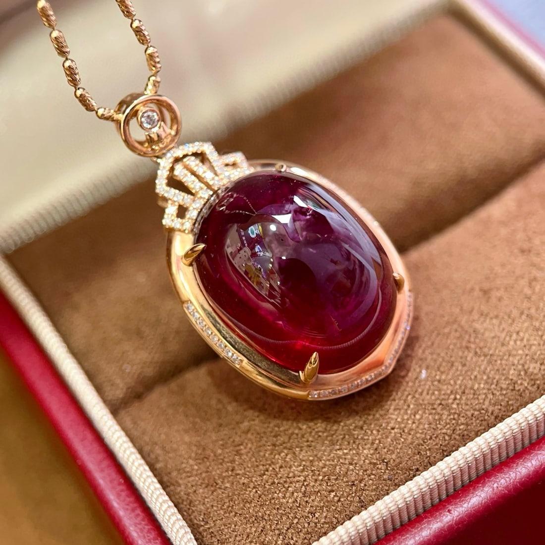 14k Gold 28.22 Ctw Natural Tourmaline & Diamond Pendant( Without Chain ): Ref:230975078 // gold content:14k gold // main gemstone:tourmaline // shape:oval // carat weight:28ct // color:red // treatment:natural // // adjacent gemstone 2 : diamond // shape:round // carat
