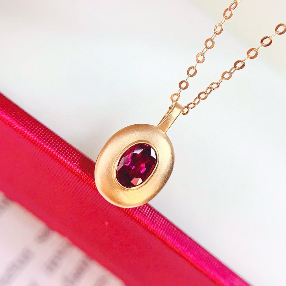 14k Gold 0.5 Ct Natural Ruby Pendant( Without Chain ): Ref:230975104 // gold content:14k gold // main gemstone:ruby // shape:oval // carat weight:0. 5ct // color:red // treatment:natural // Condition: New High Estimate: 2600 Low Estimate: 1800