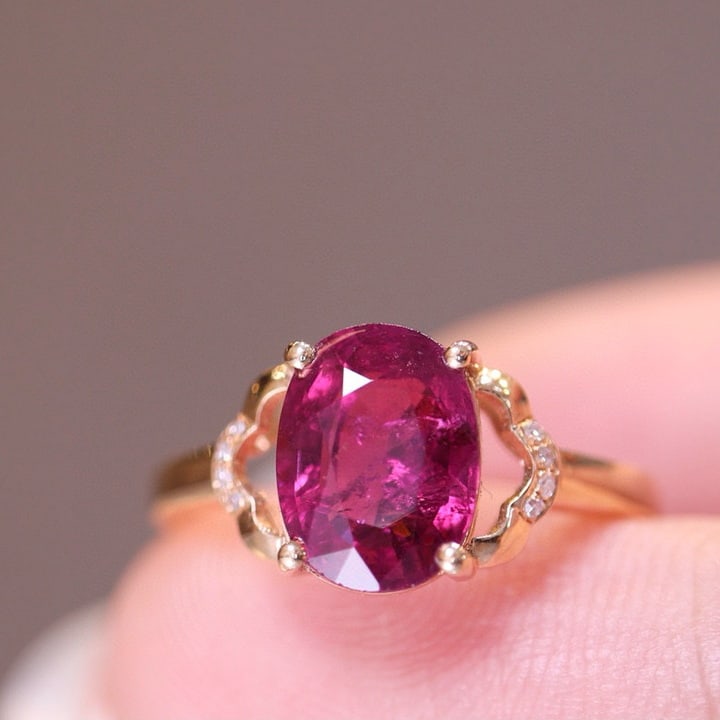 14k Gold 2.28 Ct Natural Tourmaline & Diamond Ring: Ref:230975254 // gold content:14k gold // ring size:7. 25us // // main gemstone:tourmaline // shape:oval // carat weight:2. 28ct // color:red // treatment:natural // // adjacent gemstone 2 : diamond /