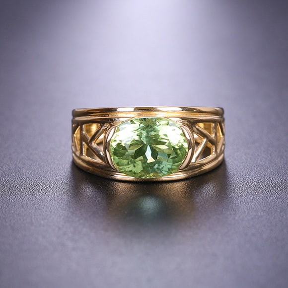 14k Gold 3.3 Ct Natural Tourmaline Ring: Ref:230976090 // gold content:14k gold // ring size:7. 25us // // main gemstone:tourmaline // shape:oval // carat weight:3. 3ct // color:green // treatment:natural // Condition: New Low Estimate:
