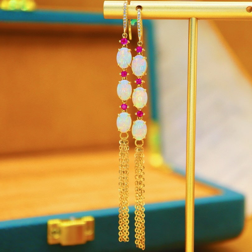 14k Gold 2.41 Ctw Natural Opal & Diamond Earrings: Ref:230976122 // gold content:14k gold // main gemstone:opal // shape:oval // carat weight:2. 35ct // color:white // treatment:natural // // adjacent gemstone 2 : diamond // number of stones:20 //