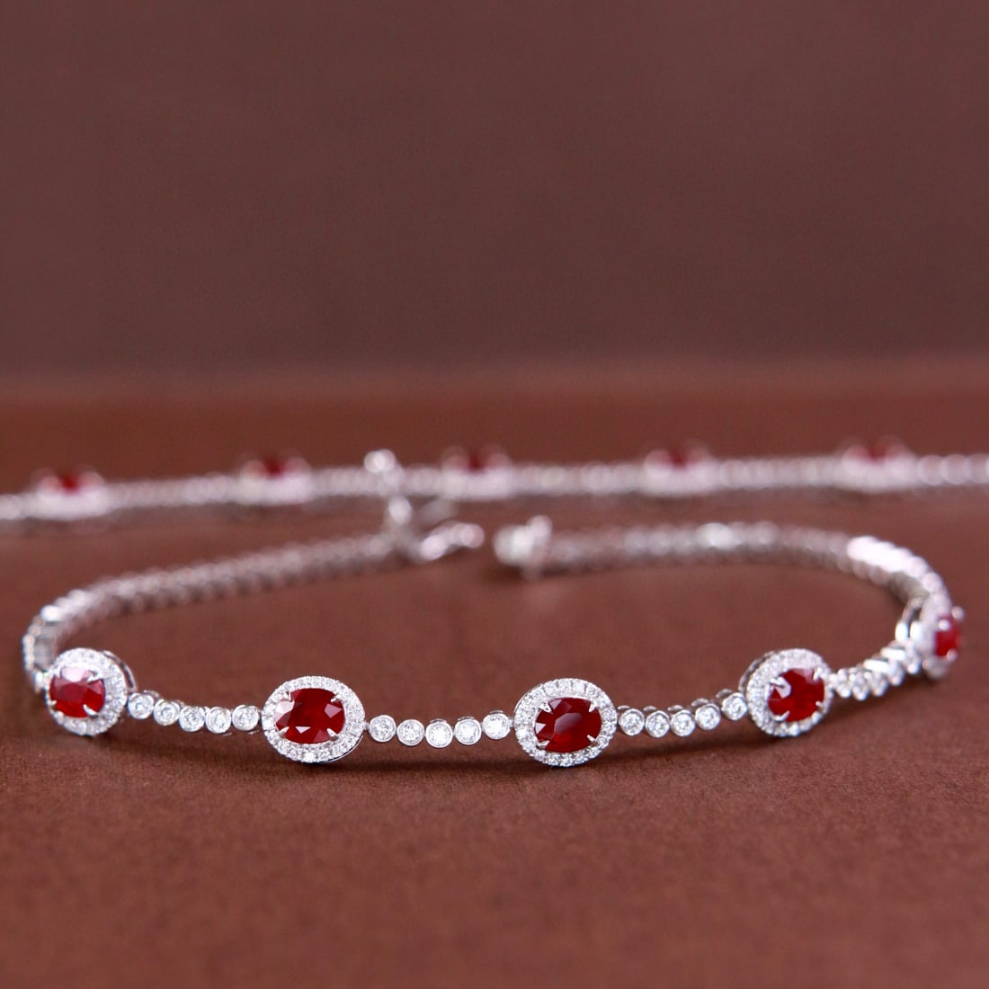 14k Gold 1.93 Ctw Natural Ruby & Diamond Bracelet: Ref:230976213 // gold content:14k gold // main gemstone:ruby // shape:oval // carat weight:1. 54ct // color:pigeonblood red // treatment:natural // // adjacent gemstone 2 : diamond // shape:round //