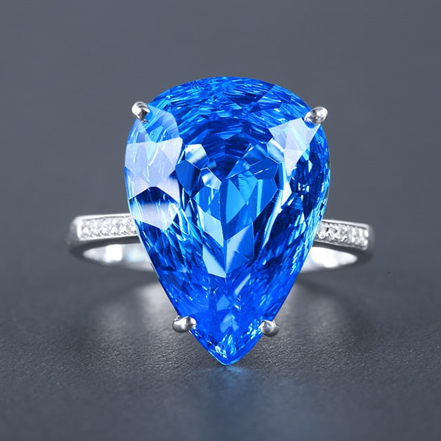 14k Gold 10.62 Ctw Natural Topaz & Diamond Ring: Ref:230976280 // gold content:14k gold // ring size:7. 25us // // main gemstone:topaz // shape:pear // carat weight:10. 58ct // color:blue // treatment:natural // // adjacent gemstone 2 : diamond //