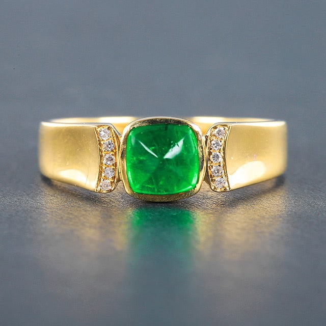 14k Gold 0.89 Ctw Vivid Green Natural Emerald & Diamond Ring: Ref:230976296 // gold content:14k gold // ring size:7. 25us // // main gemstone:emerald // shape:suger-loaf // carat weight:0. 86ct // color:vivid green // treatment:natural // // adjacent gemstone 2