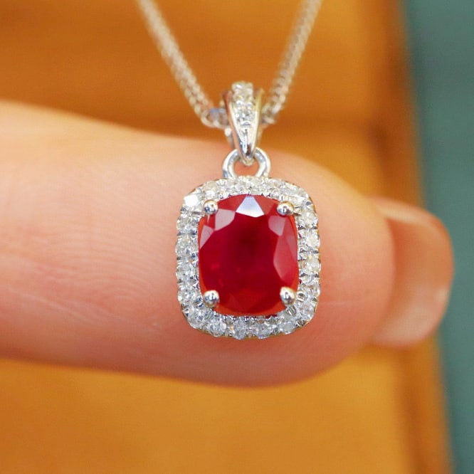 14k Gold 0.85 Ctw Natural Ruby & Diamond Pendant( Without Chain ): Ref:230976308 // gold content:14k gold // main gemstone:ruby // shape:oval // carat weight:0. 73ct // color:red // treatment:natural // // adjacent gemstone 2 : diamond // number of stones:24 //