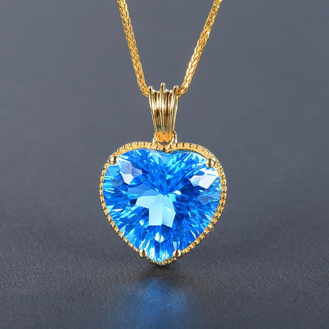 14k Gold 8.45 Ct Natural Topaz Pendant( Without Chain ): Ref:230976322 // gold content:14k gold // main gemstone:topaz // shape:heart // carat weight:8. 45ct // color:blue // treatment:natural // Low Estimate: 1400 High Estimate: 2100 Condition: New
