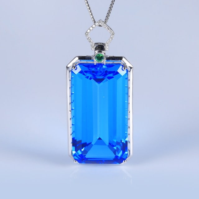14k Gold 44.95 Ctw Natural Topaz & Diamond Pendant( Without Chain ): Ref:230976320 // gold content:14k gold // main gemstone:topaz // shape:octagonal // carat weight:44. 9ct // color:blue // treatment:natural // // adjacent gemstone 2 : diamond // number of stones:19