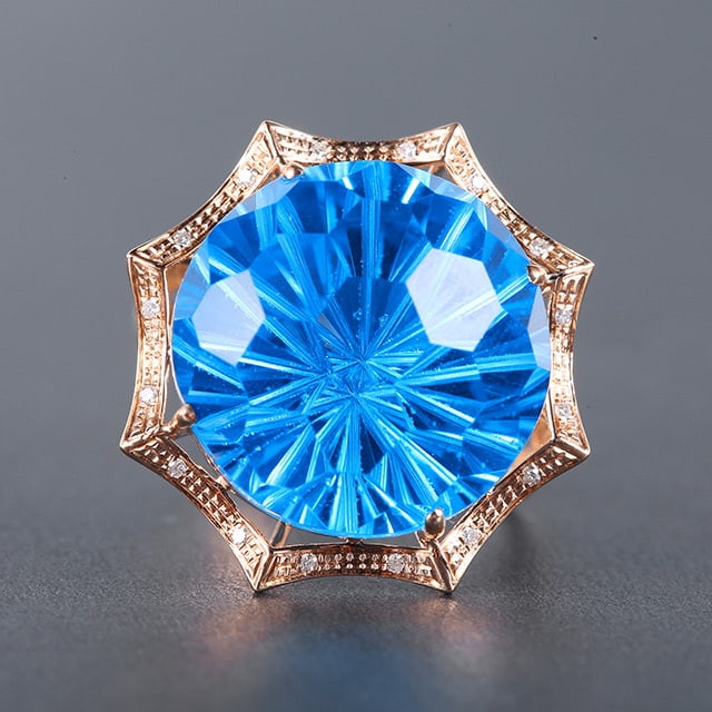 14k Gold 19.63 Ctw Natural Topaz & Diamond Ring: Ref:230976367 // gold content:14k gold // ring size:7. 25us // // main gemstone:topaz // shape:round // carat weight:19. 58ct // color:blue // treatment:natural // cut grade:g // // adjacent gemstone