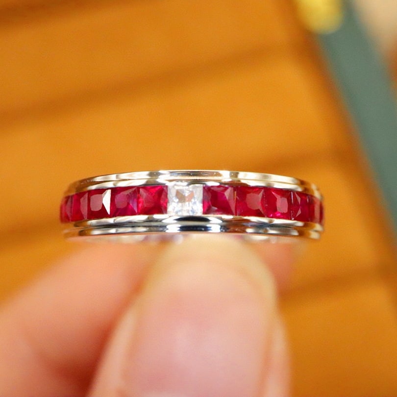14k Gold 0.96 Ctw Natural Ruby & Sapphire Ring: Ref:230976361 // gold content:14k gold // ring size:7. 25us // // main gemstone:ruby // shape:princess // carat weight:0. 86ct // color:red // treatment:natural // // adjacent gemstone 2 : sapphire