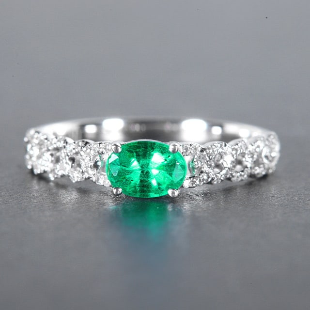 14k Gold 0.84 Ctw Natural Emerald & Diamond Ring: Ref:230976371 // gold content:14k gold // ring size:7. 25us // // main gemstone:emerald // shape:oval // carat weight:0. 65ct // color:green // treatment:natural // // adjacent gemstone 2 : diamond