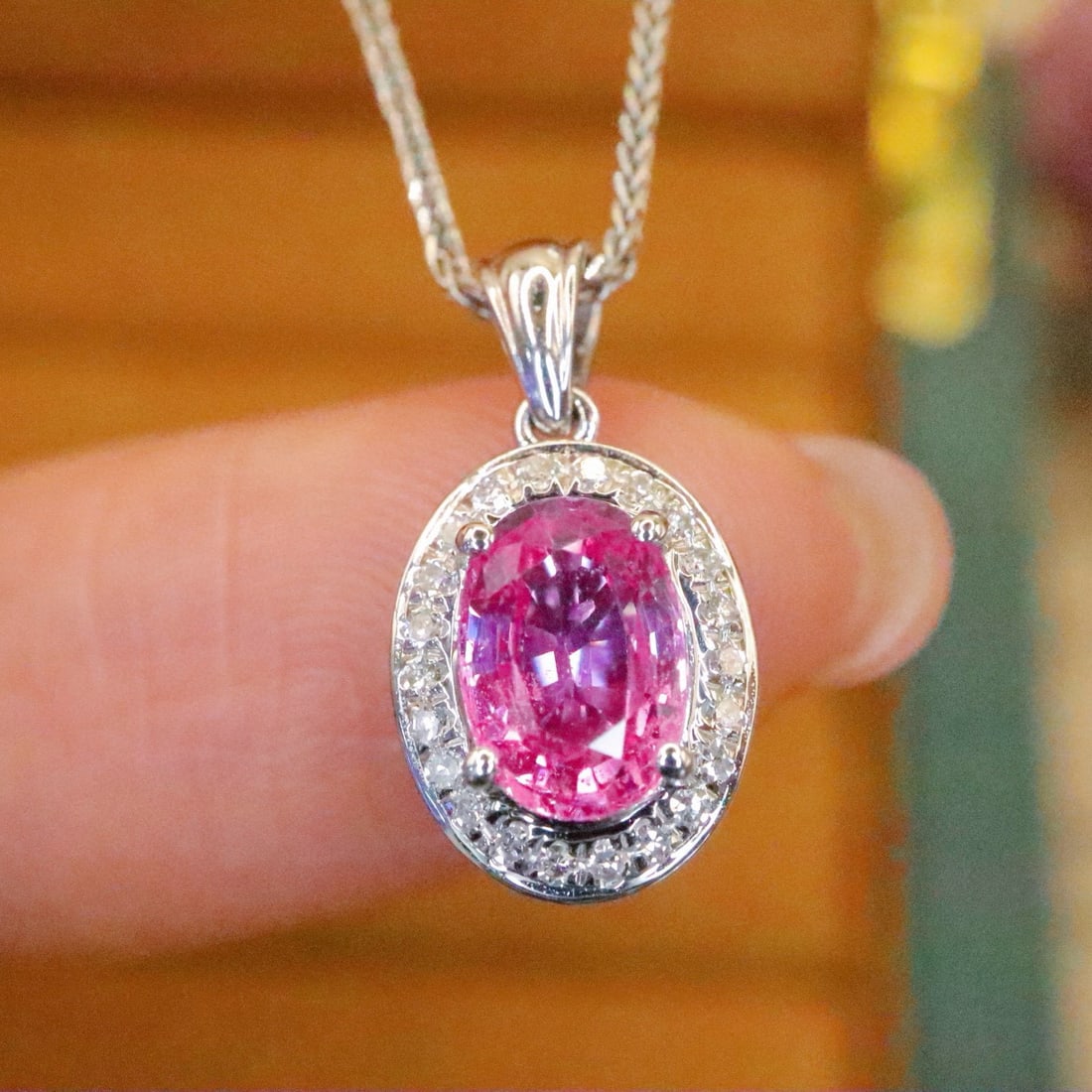 14k Gold 0.99 Ctw Natural Padparadscha Sapphire & Diamond Pendant( Without Chain ): Ref:230976374 // gold content:14k gold // main gemstone:padparadscha sapphire // shape:oval // carat weight:0. 88ct // color:orangish pink // treatment:natural // // adjacent gemstone 2 : diamond //