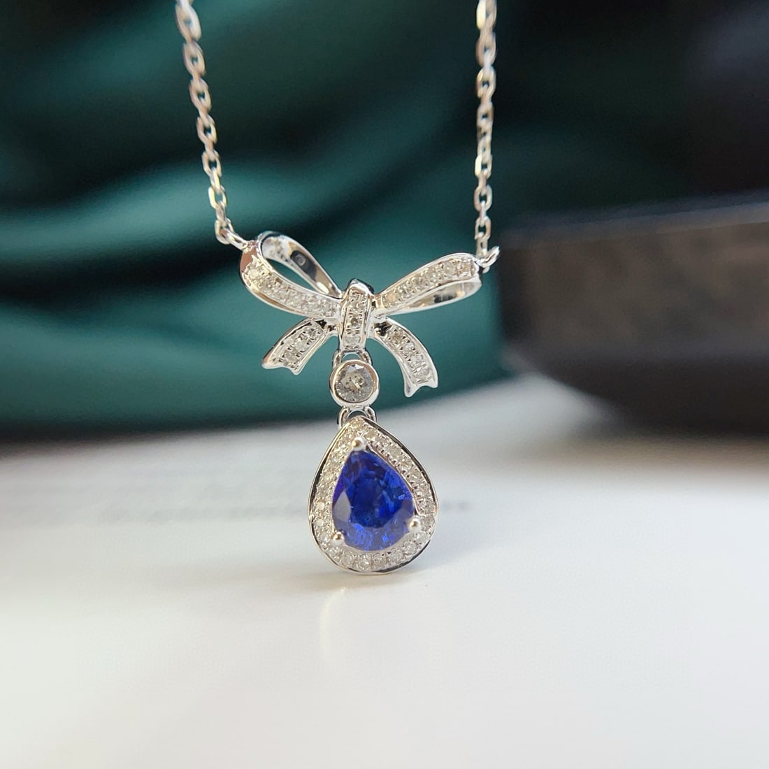 14k Gold 0.62 Ct Natural Sapphire & Diamond & Sapphire Necklace: Ref:230976434 // gold content:14k gold // main gemstone:sapphire // shape:pear // carat weight:0. 62ct // color:blue // treatment:natural // // adjacent gemstone 2 : diamond // number of stones:46 //