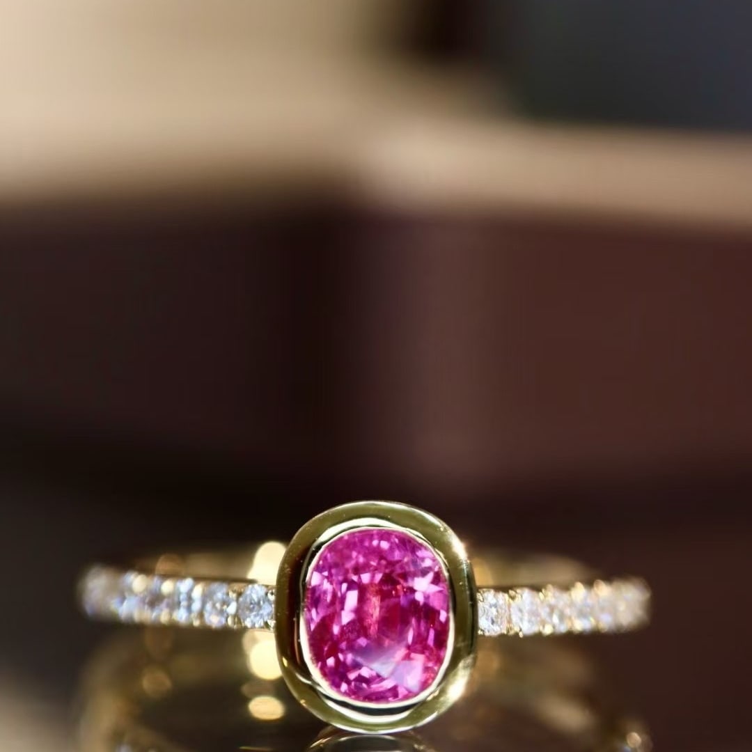 14k Gold 0.75 Ctw Natural Padparadscha Sapphire & Diamond Ring: Ref:230976435 // gold content:14k gold // ring size:7. 25us // // main gemstone:padparadscha sapphire // shape:oval // carat weight:0. 65ct // color:orangish pink // treatment:natural // // adjacent g