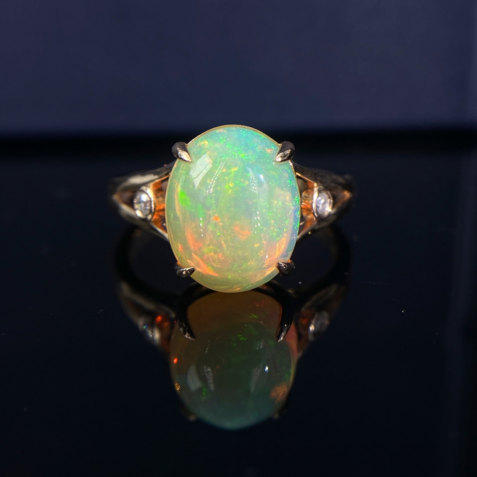14k Gold 2.89 Ctw Natural Opal & Diamond Ring: Ref:230977002 // gold content:14k gold // ring size:7. 25us // // main gemstone:opal // shape:oval // carat weight:2. 86ct // color:color // treatment:natural // // adjacent gemstone 2 : diamond //