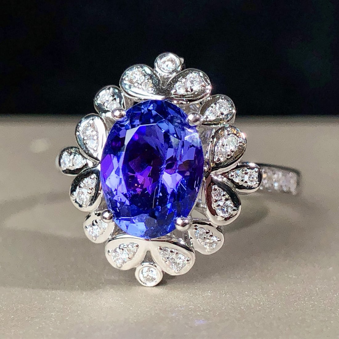 14k Gold 2.40 Ctw Natural Tanzanite & Diamond Ring: Ref:230977061 // gold content:14k gold // ring size:7. 25us // // main gemstone:tanzanite // shape:oval // carat weight:2. 14ct // color:blue // treatment:natural // // adjacent gemstone 2 : diamond