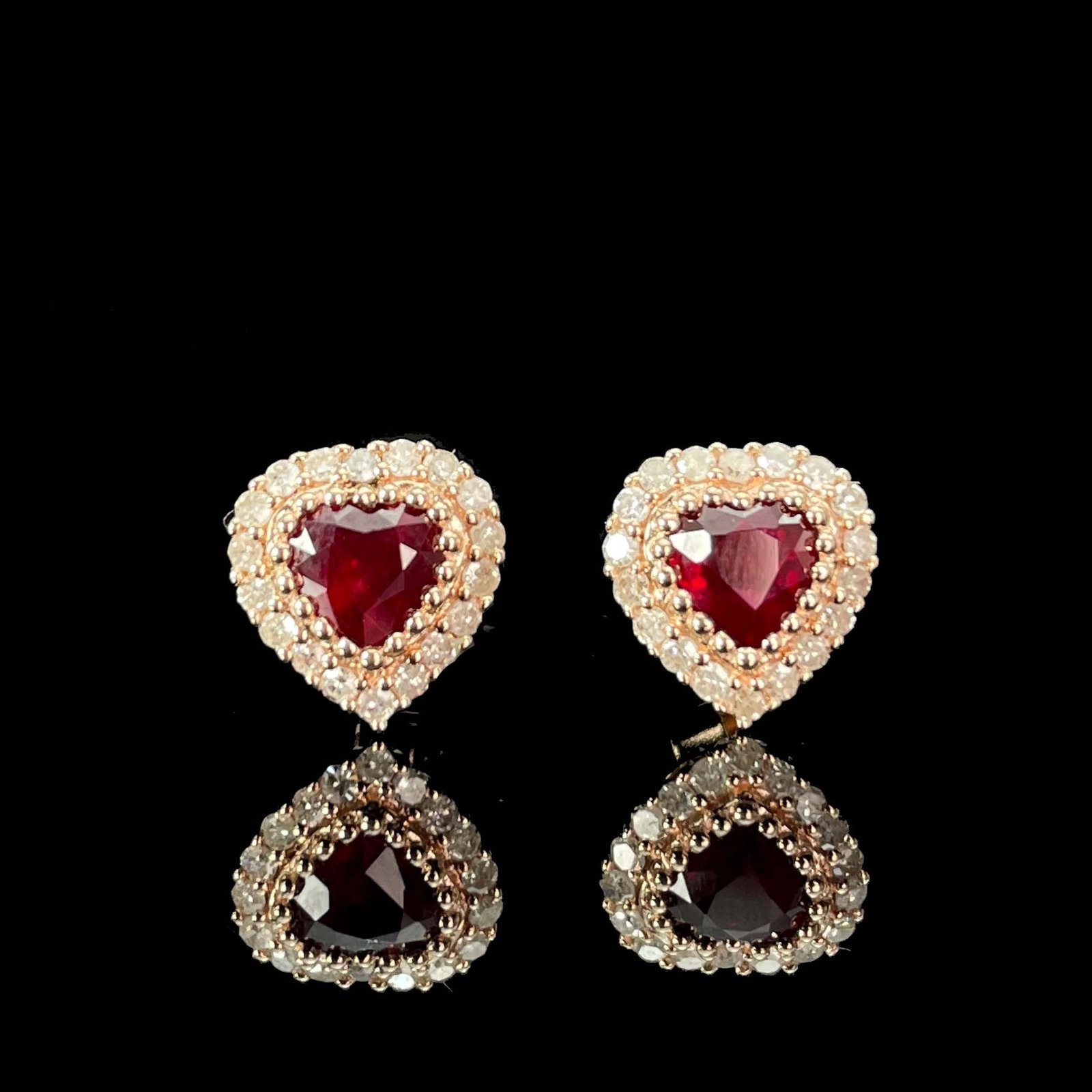 14k Gold 0.81 Ctw Natural Ruby & Diamond Earrings: Ref:230977060 // gold content:14k gold // main gemstone:ruby // shape:heart // carat weight:0. 63ct // color:red // treatment:natural // // adjacent gemstone 2 : diamond // shape:round // carat