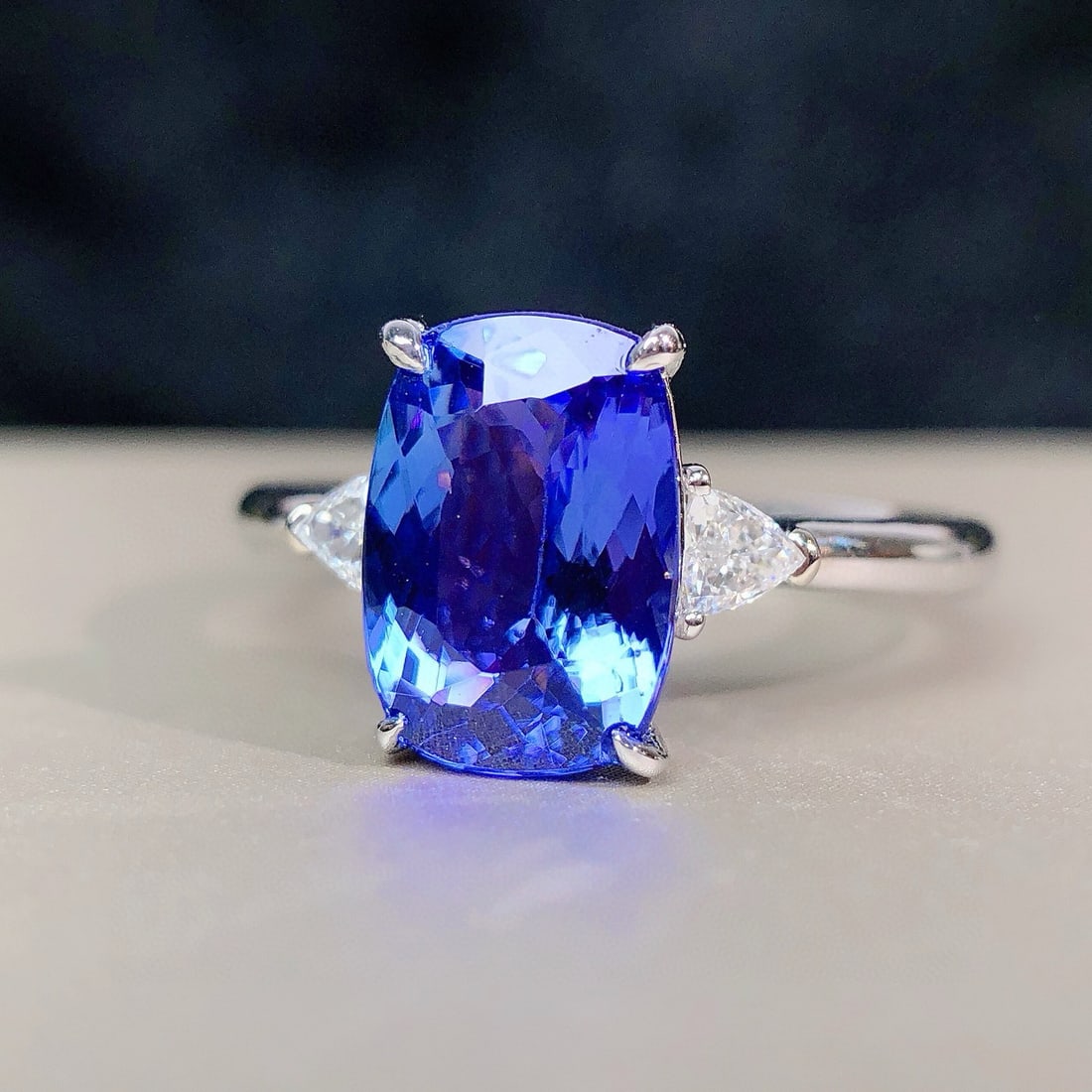 14k Gold 2.66 Ctw Natural Tanzanite & Diamond Ring: Ref:230977150 // gold content:14k gold // ring size:7. 25us // // main gemstone:tanzanite // shape:cushion // carat weight:2. 48ct // color:blue // treatment:natural // // adjacent gemstone 2 : diamon