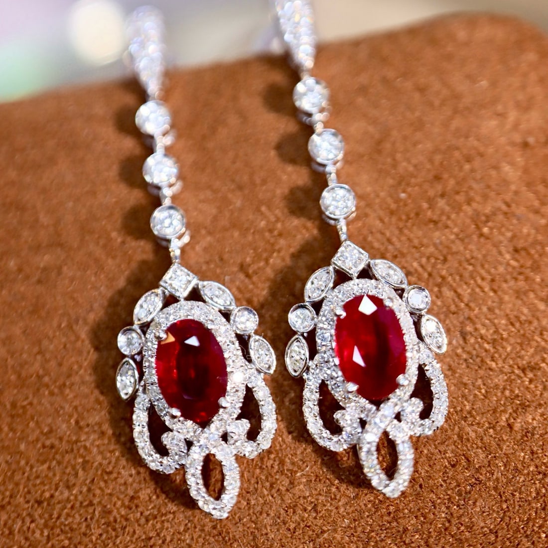 14k Gold 1.6 Ctw Natural Ruby & Diamond Earrings: Ref:230977165 // gold content:14k gold // main gemstone:ruby // shape:oval // carat weight:1. 2ct // color:red // treatment:natural // // adjacent gemstone 2 : diamond // shape:round // carat