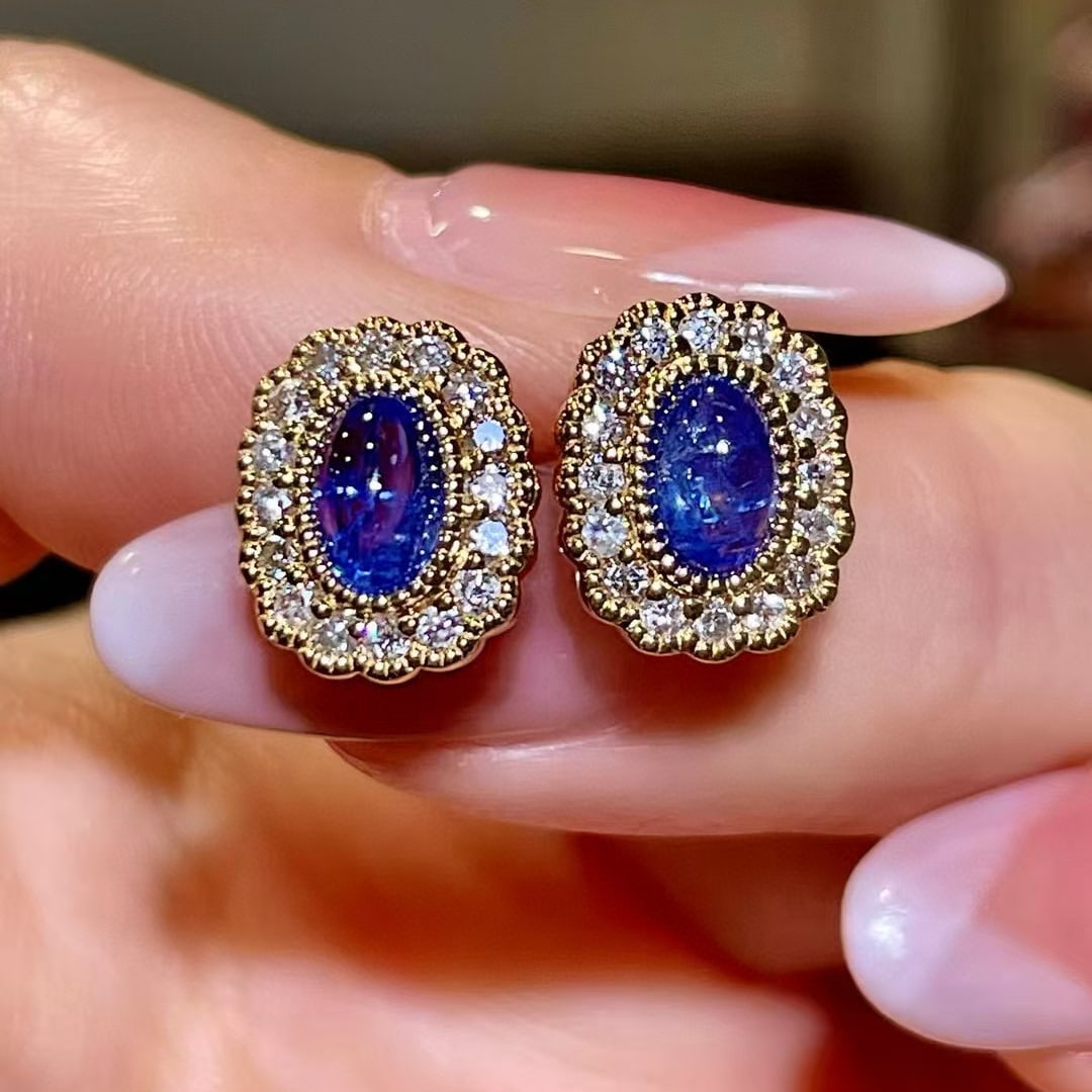 14k Gold 2.14 Ctw Natural Sapphire & Diamond Earrings: Ref:230977232 // gold content:14k gold // main gemstone:sapphire // shape:oval // carat weight:1. 66ct // color:blue // treatment:natural // // adjacent gemstone 2 : diamond // shape:round // carat