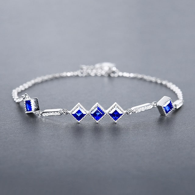 14k Gold 1.38 Ctw Natural Sapphire & Diamond Bracelet: Ref:230978010 // gold content:14k gold // main gemstone:sapphire // shape:square // carat weight:1. 31ct // color:cornflower blue // treatment:natural // // adjacent gemstone 2 : diamond // number of