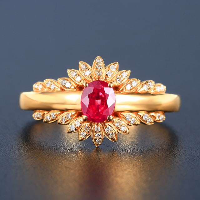 14k Gold 0.81 Ctw Natural Ruby & Diamond Ring: Ref:230978056 // gold content:14k gold // ring size:7. 25us // // main gemstone:ruby // shape:oval // carat weight:0. 67ct // color:red // treatment:natural // // adjacent gemstone 2 : diamond //