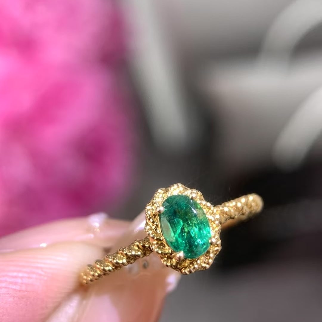 14k Gold 0.66 Ct Natural Emerald Ring: Ref:230978125 // gold content:14k gold // ring size:7. 25us // // main gemstone:emerald // shape:oval // carat weight:0. 66ct // color:green // treatment:natural // High Estimate: 3300 Condition: New