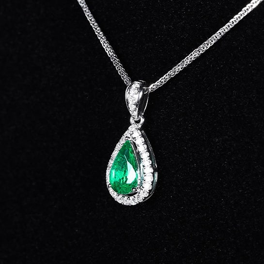 14k Gold 0.56 Ctw Natural Emerald & Diamond Pendant( Without Chain ): Ref:230978081 // gold content:14k gold // main gemstone:emerald // shape:pear // carat weight:0. 42ct // color:green // treatment:natural // // adjacent gemstone 2 : diamond // number of stones:29 //