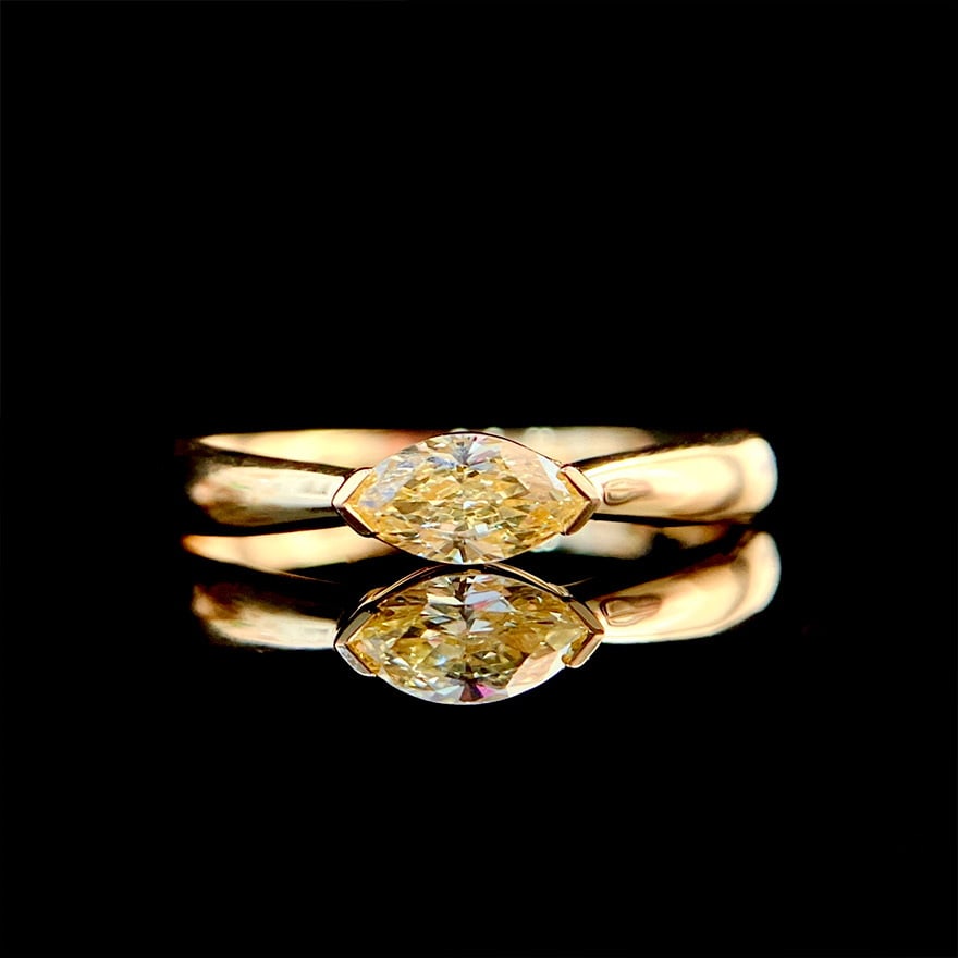 14k Gold 0.30 Ct Natural Yellow Diamond Ring: Ref:230978142 // gold content:14k gold // ring size:7. 25us // // main gemstone:yellow diamond // shape:marquise // carat weight:0. 30ct // color:yellow // treatment:natural // High Estimate: 6600