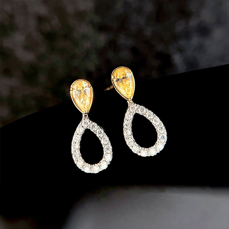 14k Gold 0.60 Ctw Natural Yellow Diamond & Diamond Earrings: Ref:230978093 // gold content:14k gold // main gemstone:yellow diamond // shape:pear // carat weight:0. 36ct // color:yellow // treatment:natural // // adjacent gemstone 2 : diamond // shape:round //