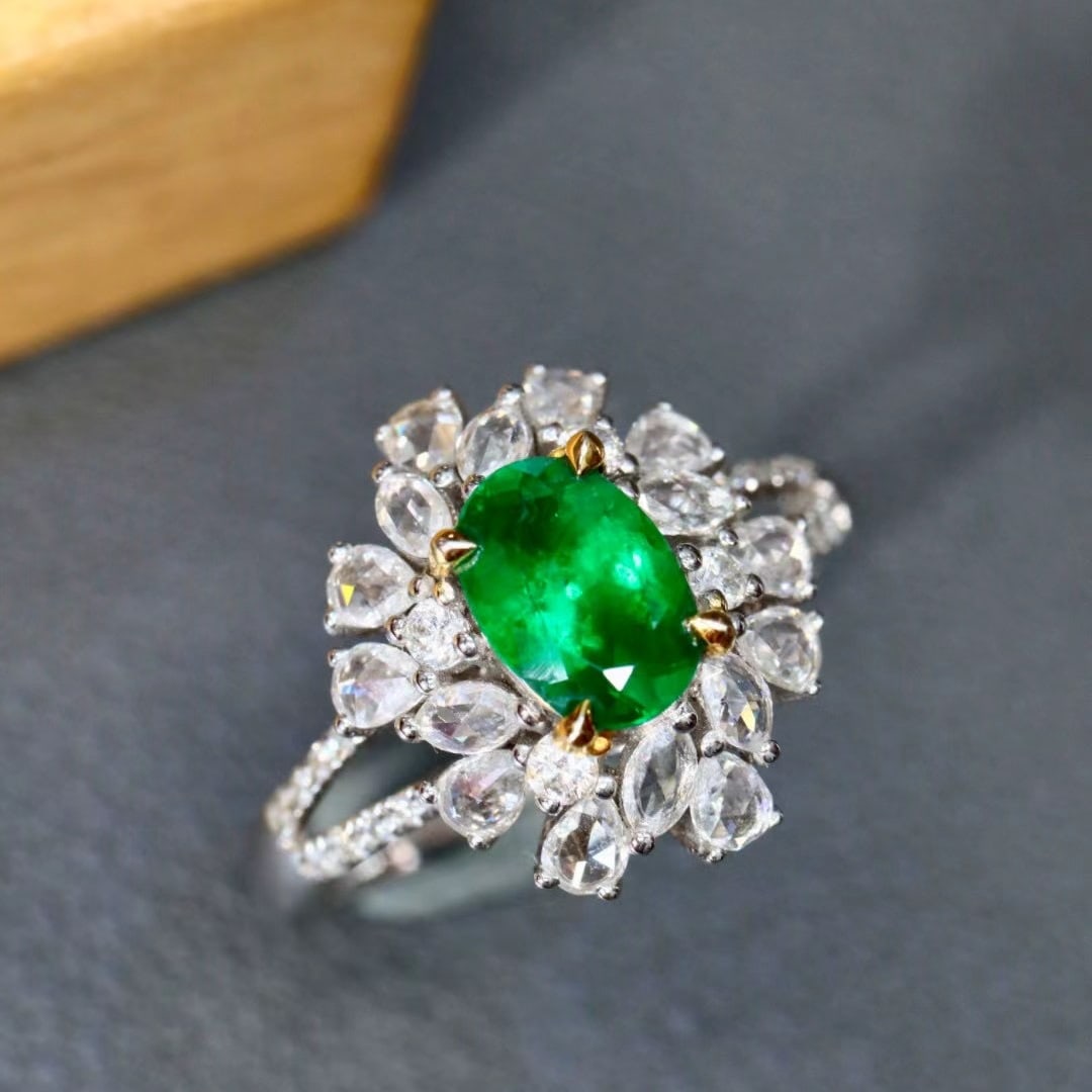 14k Gold 1.35 Ctw Vivid Green Natural Emerald & Diamond Ring: Ref:230978180 // gold content:14k gold // ring size:7. 25us // // main gemstone:emerald // shape:oval // carat weight:0. 67ct // color:vivid green // treatment:natural // // adjacent gemstone 2 :