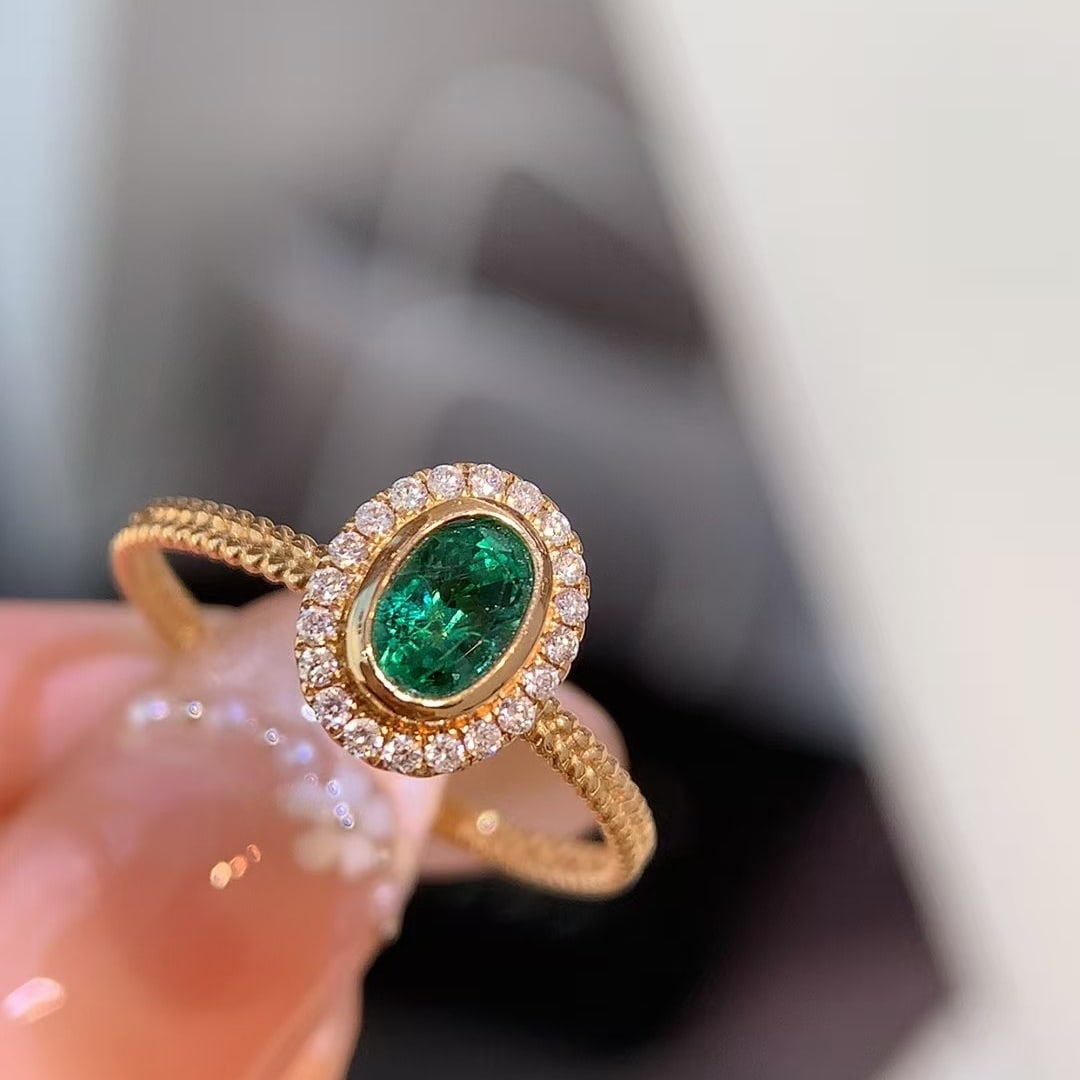 14k Gold 0.71 Ctw Vivid Green Natural Emerald & Diamond Ring: Ref:230978147 // gold content:14k gold // ring size:7. 25us // // main gemstone:emerald // shape:oval // carat weight:0. 61ct // color:vivid green // treatment:natural // // adjacent gemstone 2 : diam