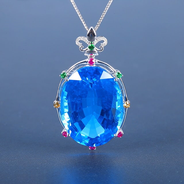 14k Gold 60.37 Ctw Natural Topaz & Diamond Pendant( Without Chain ): Ref:230978141 // gold content:14k gold // main gemstone:topaz // shape:oval // carat weight:60. 33ct // color:blue // treatment:natural // // adjacent gemstone 2 : diamond // number of stones:14 // sh