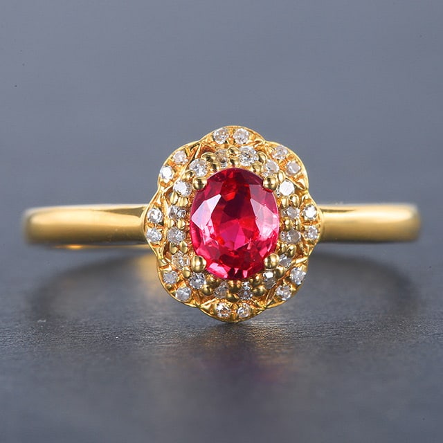 14k Gold 0.58 Ctw Natural Ruby & Diamond Ring: Ref:230978198 // gold content:14k gold // ring size:7. 25us // // main gemstone:ruby // shape:oval // carat weight:0. 45ct // color:red // treatment:natural // // adjacent gemstone 2 : diamond //
