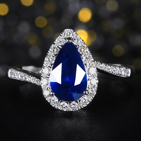 14k Gold 1.52 Ctw Natural Sapphire & Diamond Ring: Ref:230978267 // gold content:14k gold // ring size:7. 25us // // main gemstone:sapphire // shape:pear // carat weight:1. 25ct // color:royal blue // treatment:natural // // adjacent gemstone 2 :