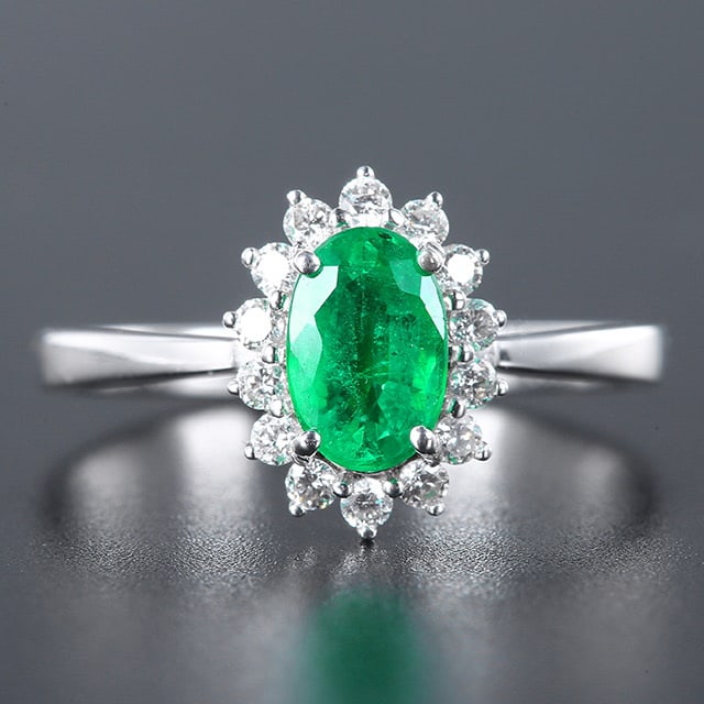 14k Gold 1.01 Ctw Vivid Green Natural Emerald & Diamond Ring: Ref:230978216 // gold content:14k gold // ring size:7. 25us // // main gemstone:emerald // shape:oval // carat weight:0. 8ct // color:vivid green // treatment:natural // // adjacent gemstone 2 : diamo