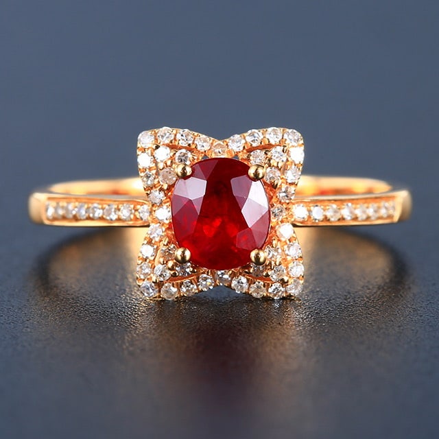 14k Gold 0.96 Ctw Natural Ruby & Diamond Ring: Ref:230978272 // gold content:14k gold // ring size:7. 25us // // main gemstone:ruby // shape:oval // carat weight:0. 78ct // color:pigeonblood red // treatment:natural // // adjacent gemstone 2 :