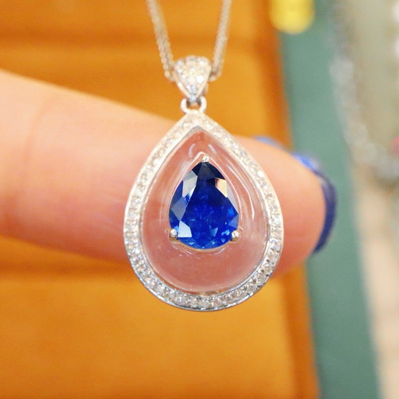 14k Gold 1.07 Ctw Natural Sapphire & Diamond Pendant( Without Chain ): Ref:230978322 // gold content:14k gold // main gemstone:sapphire // shape:pear // carat weight:0. 90ct // color:cornflower blue // treatment:natural // // adjacent gemstone 2 : diamond // number of st