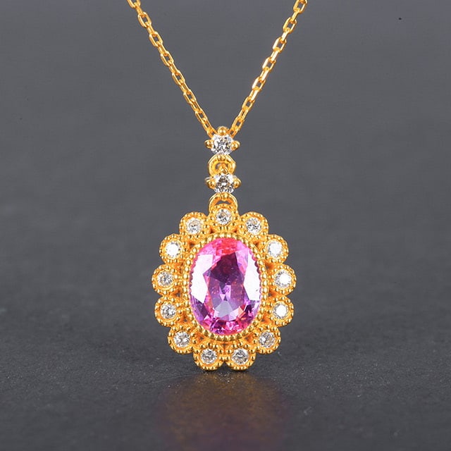 14k Gold 1.23 Ctw Natural Padparadscha Sapphire & Diamond Necklace: Ref:230978301 // gold content:14k gold // main gemstone:padparadscha sapphire // shape:oval // carat weight:1. 05ct // color:orangish pink // treatment:natural // // adjacent gemstone 2 : diamond //