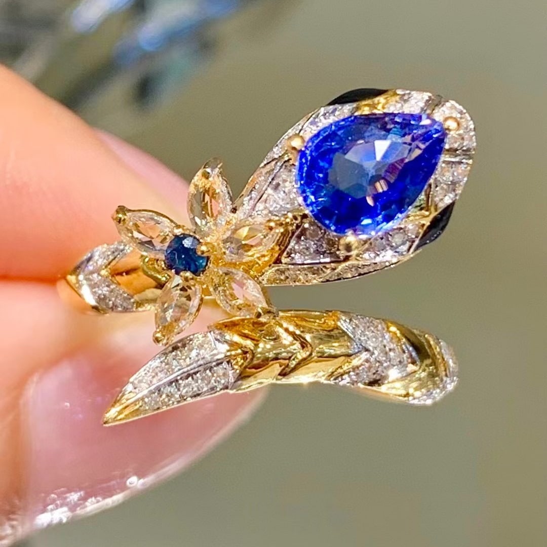 14k Gold 1.1 Ct Natural Sapphire & Diamond & Sapphire Ring: Ref:230978434 // gold content:14k gold // ring size:7. 25us // // main gemstone:sapphire // shape:pear // carat weight:1. 1ct // color:blue // treatment:natural // // adjacent gemstone 2 : diamond //