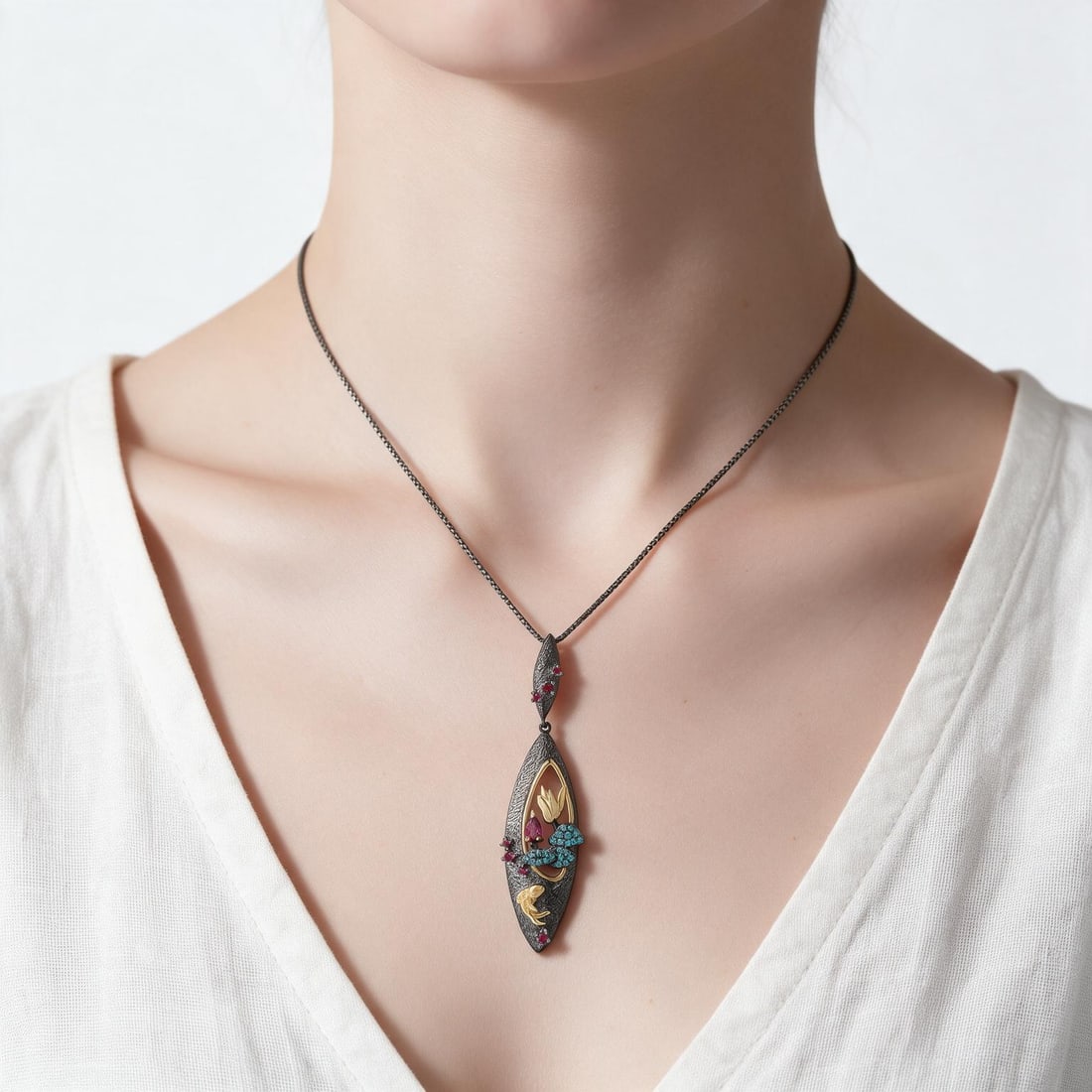 925 Sterling Silver Natural Rhodolite Garnet & Synthetic Ruby & Nano Emerald Necklace: Ref:260821168 // gold content:925 sterling silver // main gemstone:rhodolite garnet // shape:pear // carat weight: // color:red // treatment:natural // // adjacent gemstone 2 : synthetic ruby // shape