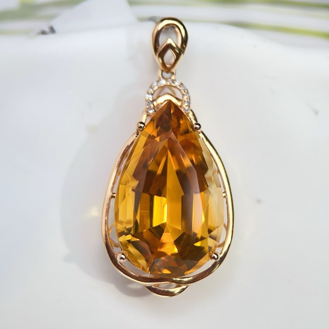 14k Gold 14.43 Ctw Natural Citrine & Diamond Pendant( Without Chain ): Ref:231200353 // gold content:14k gold // main gemstone:citrine // shape:pear // carat weight:14. 4ct // color:yellow // treatment:natural // // adjacent gemstone 2 : diamond // number of stones:12