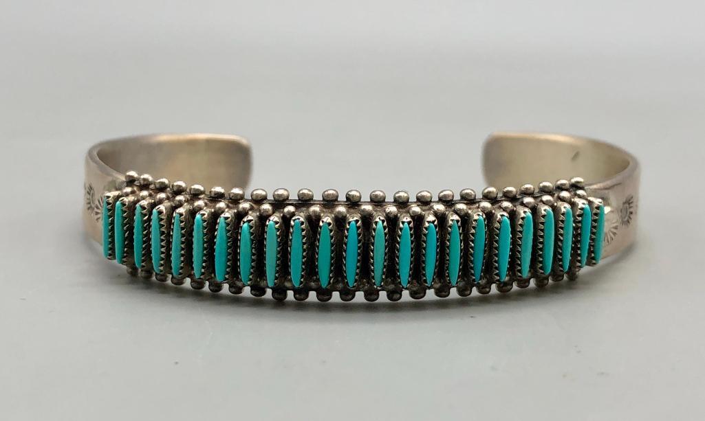 Vintage Zuni Needlepoint Bracelet- Waatsa: For your consideration is a vintage Zuni needlepoint bracelet by Waatsa. This bracelet features lovely needlepoint turquoise embedded in sawtooth bezels. The turquoise is surrounded by an array of sil