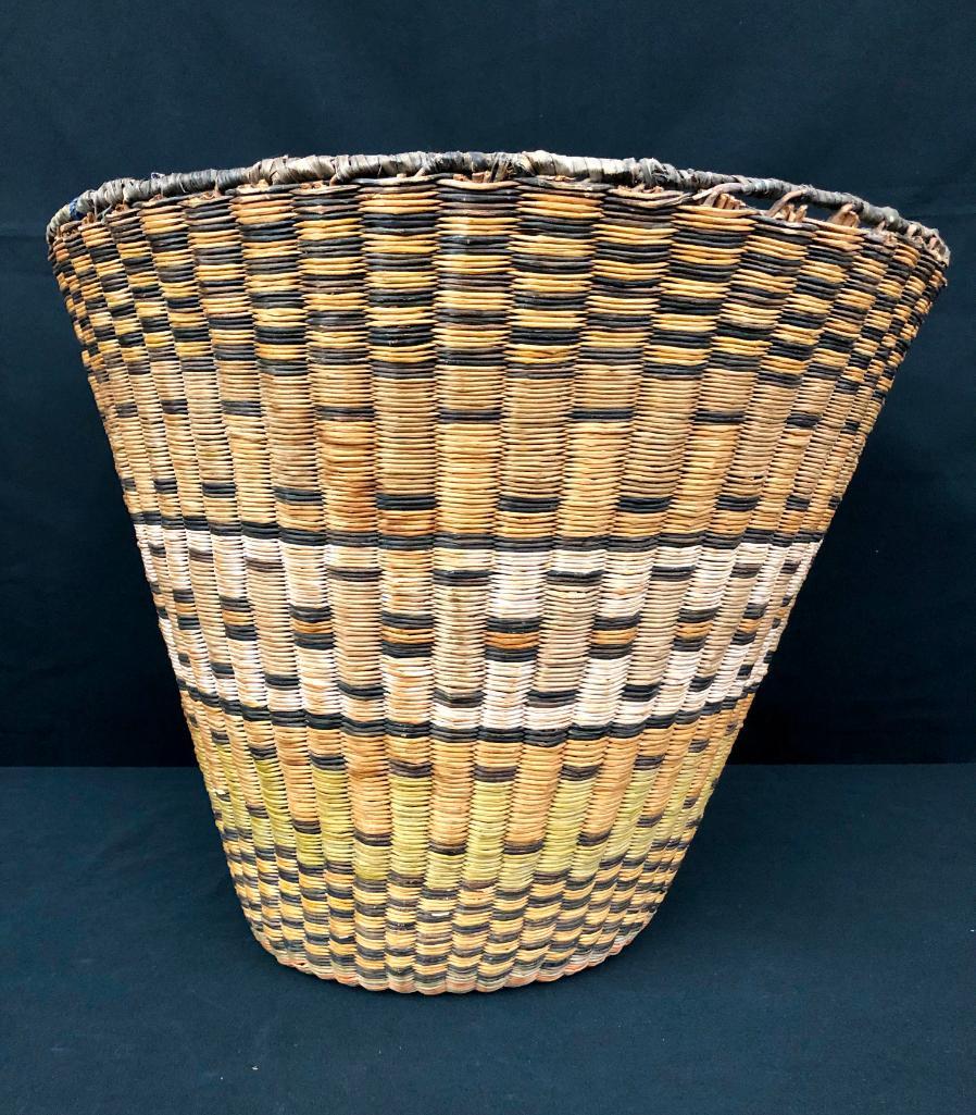 Large Hopi Peach Basket with Ribbon: Offered here for your consideration is a large Hopi wicker "peach" basket with a ribbon. Peach baskets were commonly used to carry fruit up the mesas, and are made by using coiling or wicker technique