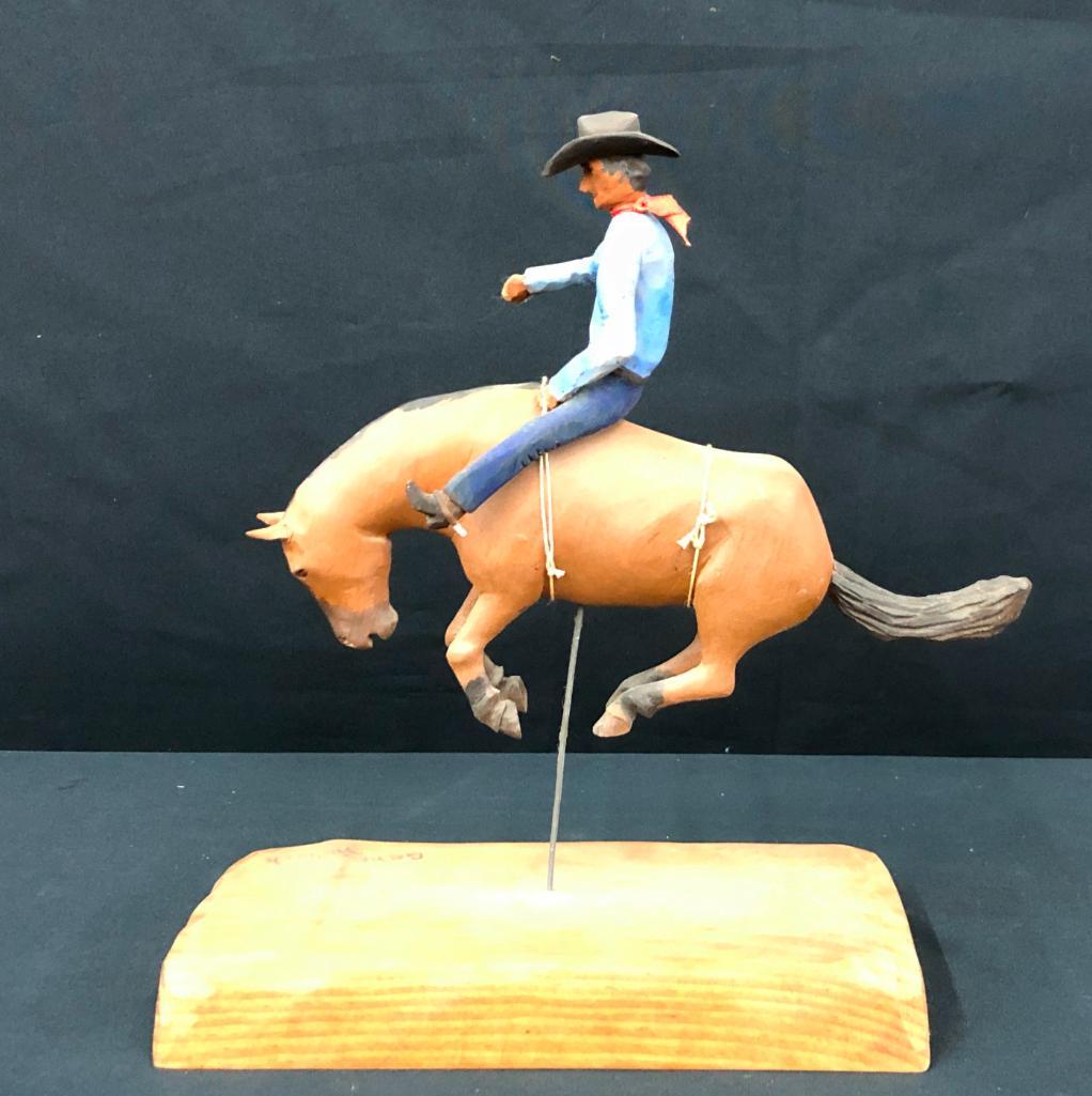Wood Carving by Gene Hoback - Bareback Rider on Little Buck: Available here for your consideration is a wood carving by Gene Hoback - Bareback Rider on Little Buck. Gene Hoback carved these carvings (lots 372 thru 375) of John McNally and Wilford Cline's rodeo 