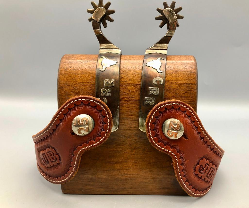 Charlie Russell Riders Spurs by Phillip Casey: Available here for your consideration are a pair of Charlie Russell Riders spurs by Phillip Casey, an Abilene, Texas maker. The spurs are mounted with the Russell Riders buffalo skull emblem, as well 